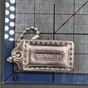 Coach silver metallic Mini Hang Tag
